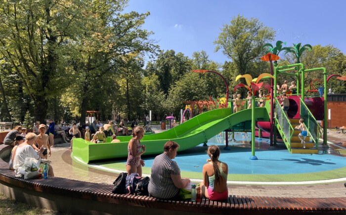 children playing on the water playground